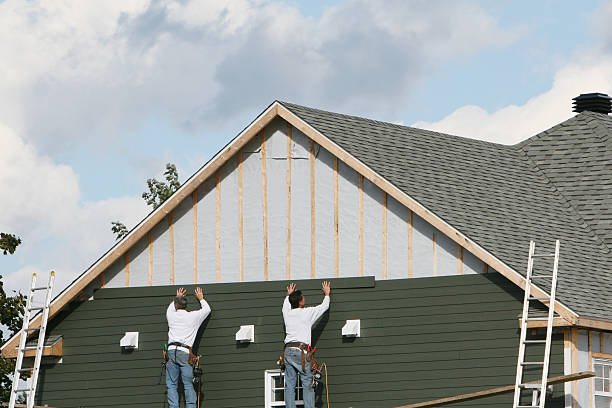 Professional Emergency Siding Repair technician working in Hammondsville, OH